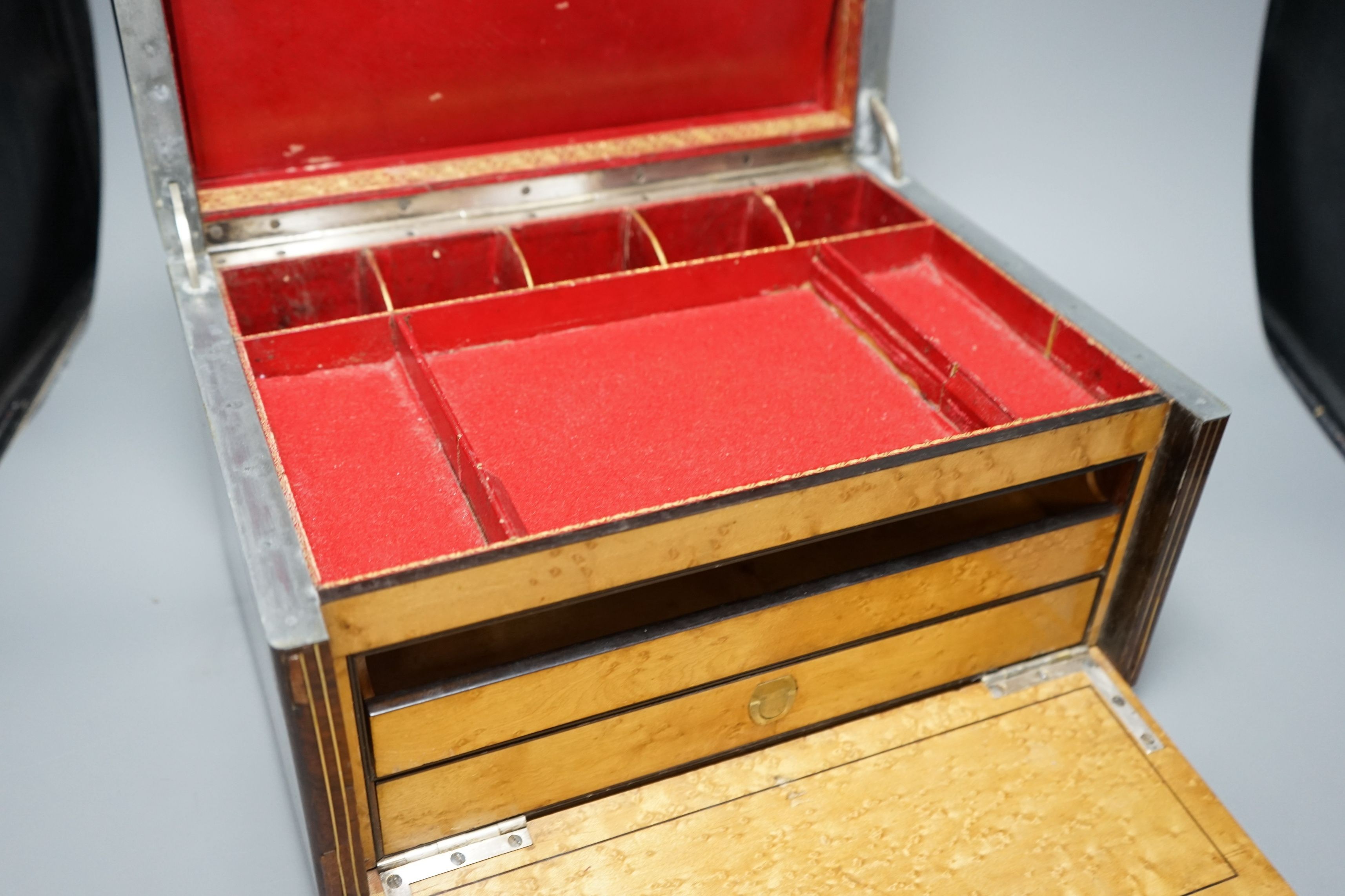 A Victorian rosewood stationery box, with red Morocco interior, by S Woodfield, 21 high x 35cms wide